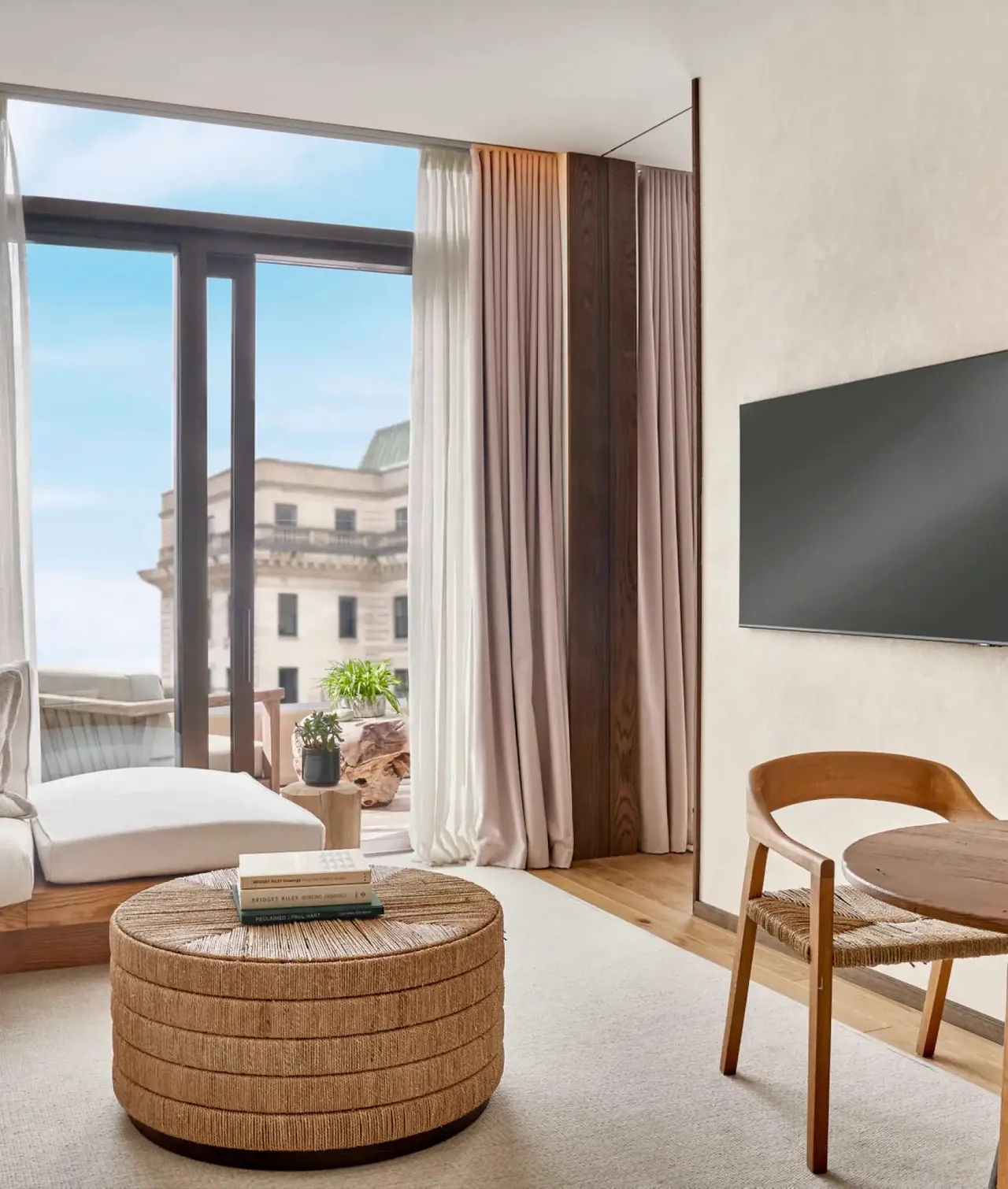 The Skyline Terrace living room with tall windows onto Mayfair.