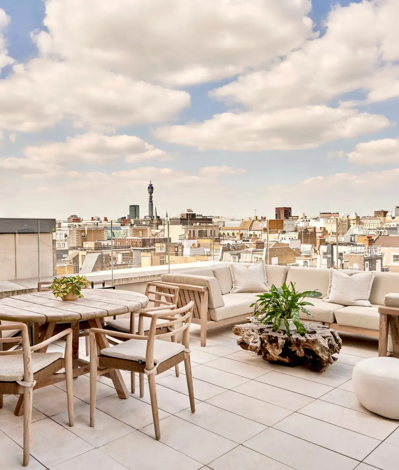 A furnished terrace looking out over the London rooftops.