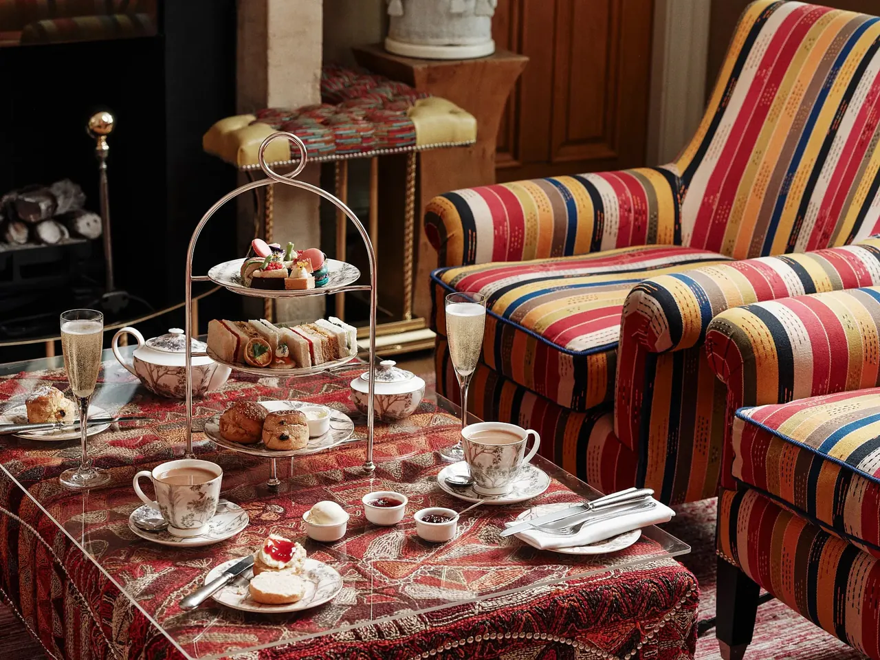 Afternoon tea on a tiered stand in the drawing room.