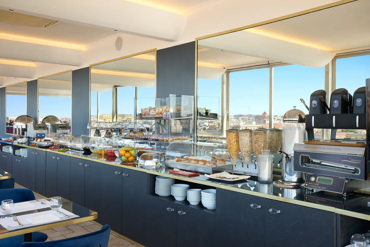The breakfast buffet in the glass room on the roof.