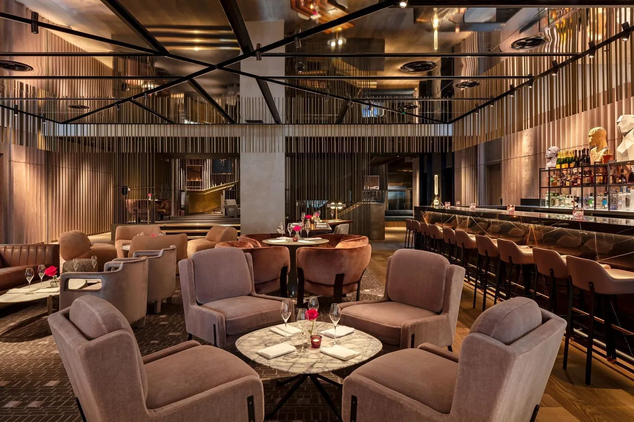 The Stage, the lobby bar with soft armchairs and a long counter.