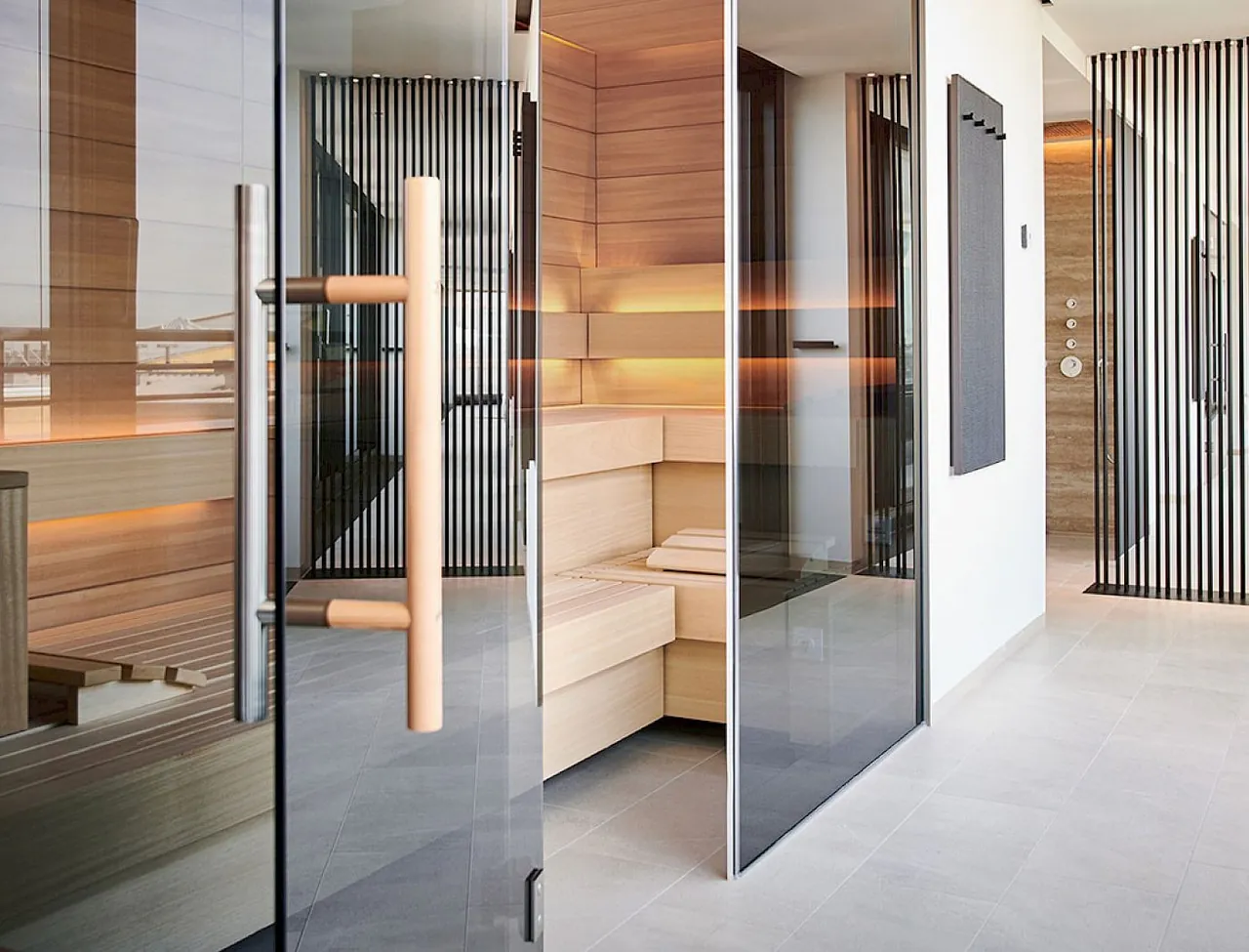 A wooden sauna behind a glass door in the rooftop spa.